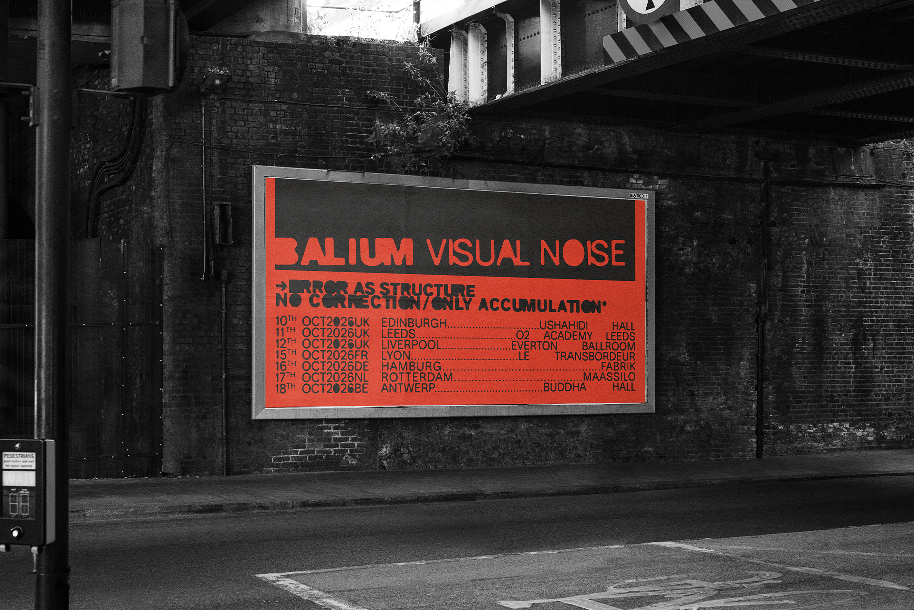 Bright red concert poster mounted on dark brick wall with tour dates, gritty urban setting with industrial overhead structures
