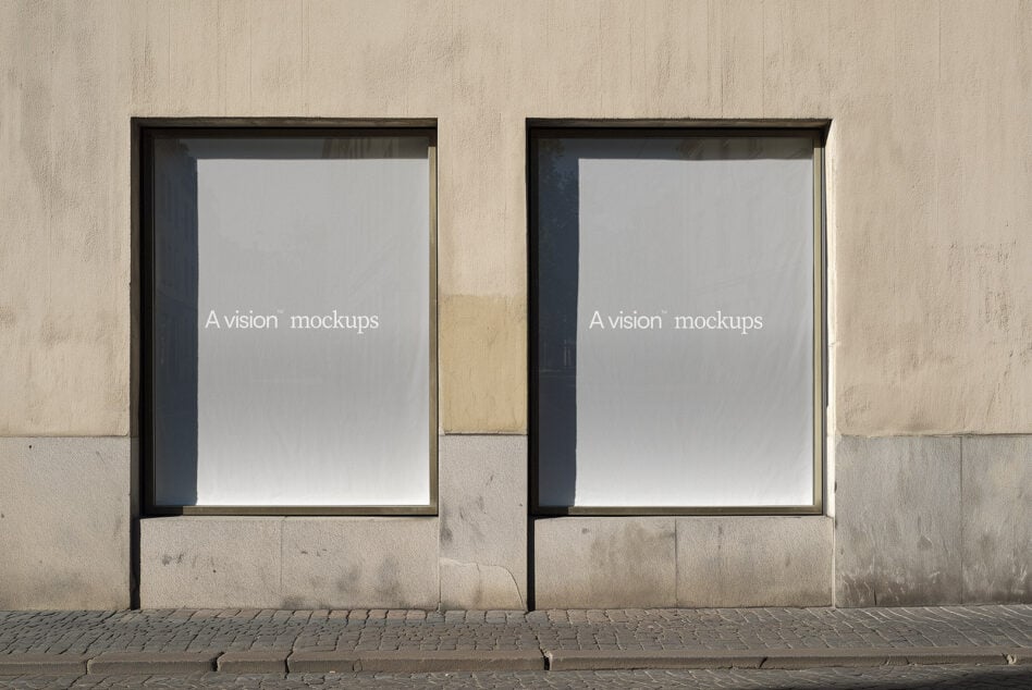 Minimalist storefront with two identical black-framed blank poster mockup templates