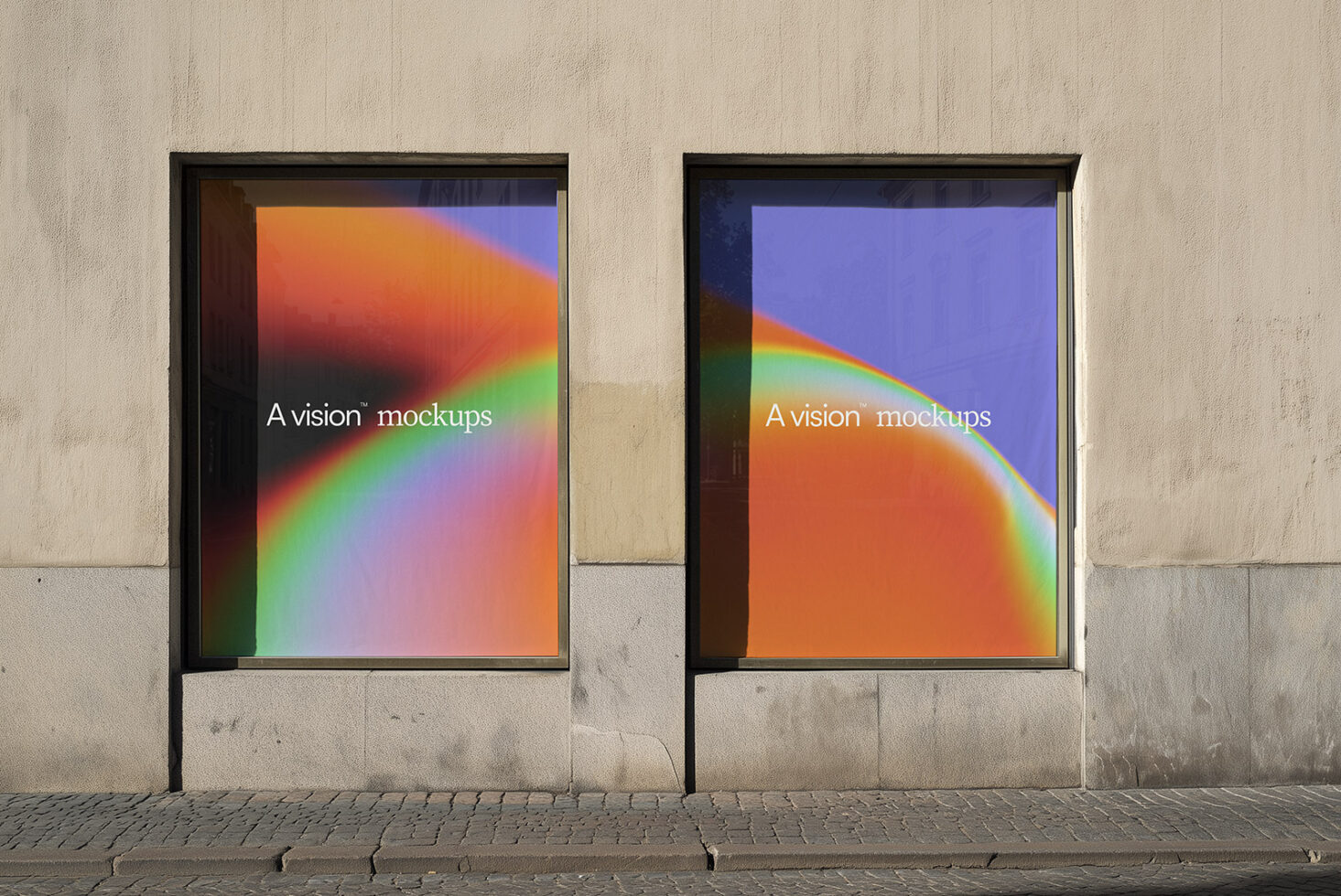Urban storefront window showing dual framed displays with colorful gradient backgrounds