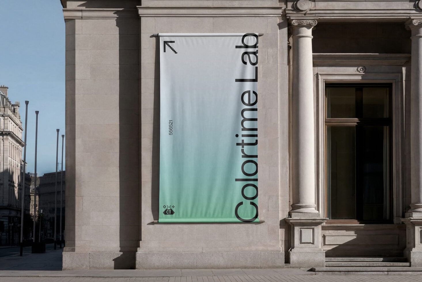 White banner with gradient fade mounted on stone facade with pixel arrow