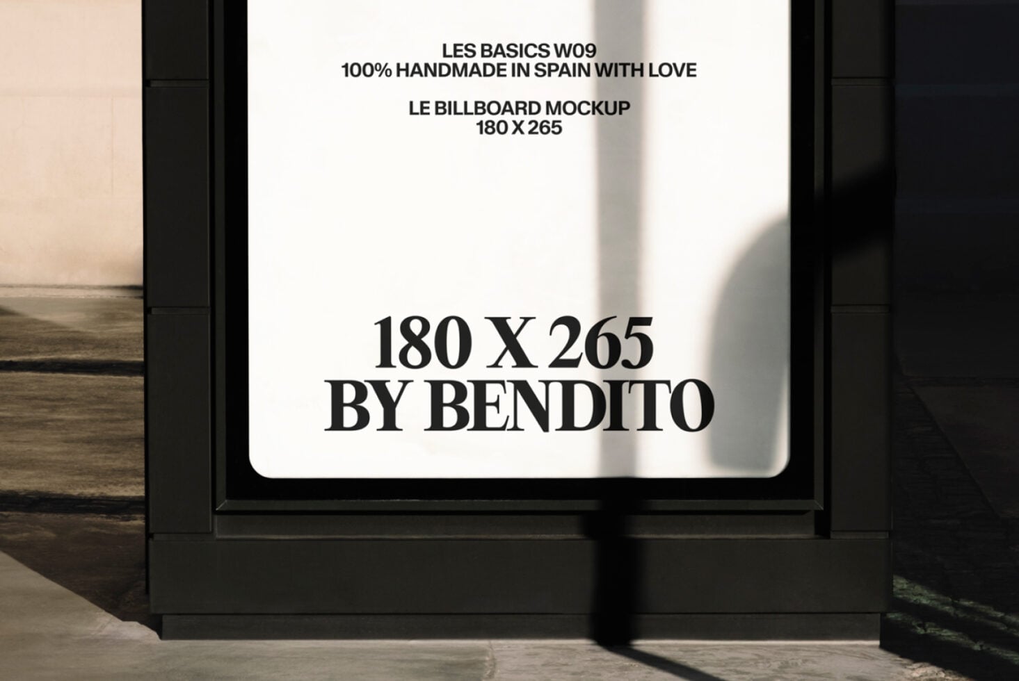 Black framed billboard mockup mounted on wall with sample text layout