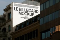Light billboard mockup on building facade showing Le Billboard Mockup text layout