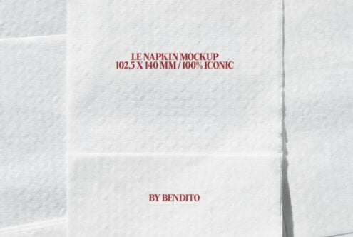 Ivory napkin mockup with burgundy text layout displayed on white surface
