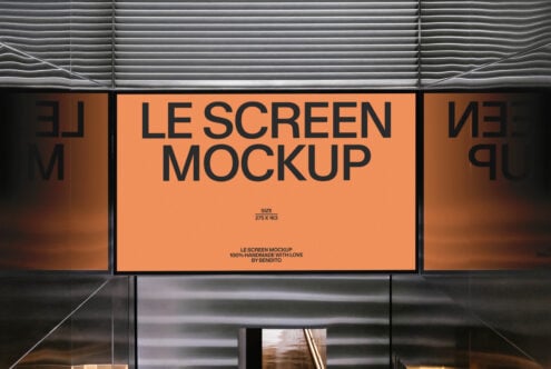 Orange billboard mockup with black text displayed in urban setting above metal shutter