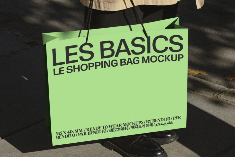 Bright lime tote bag display with black handles in natural sunlight