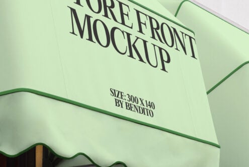 Soft green wavy shop awning with serif text above storefront display