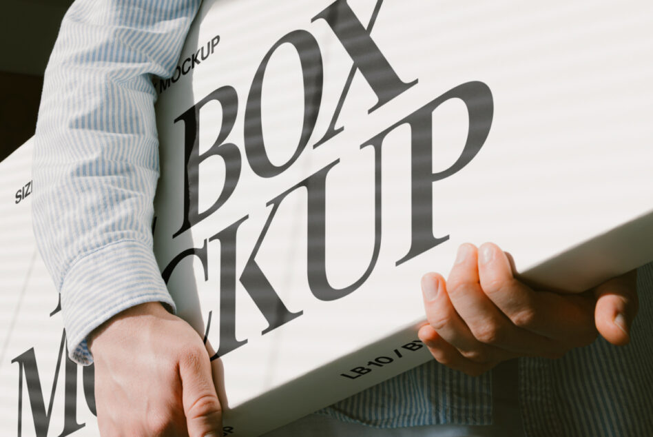 Hands holding white paper with serif typography mockup in natural light