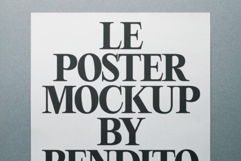 Minimal white poster with large serif typography, neutral gray backdrop