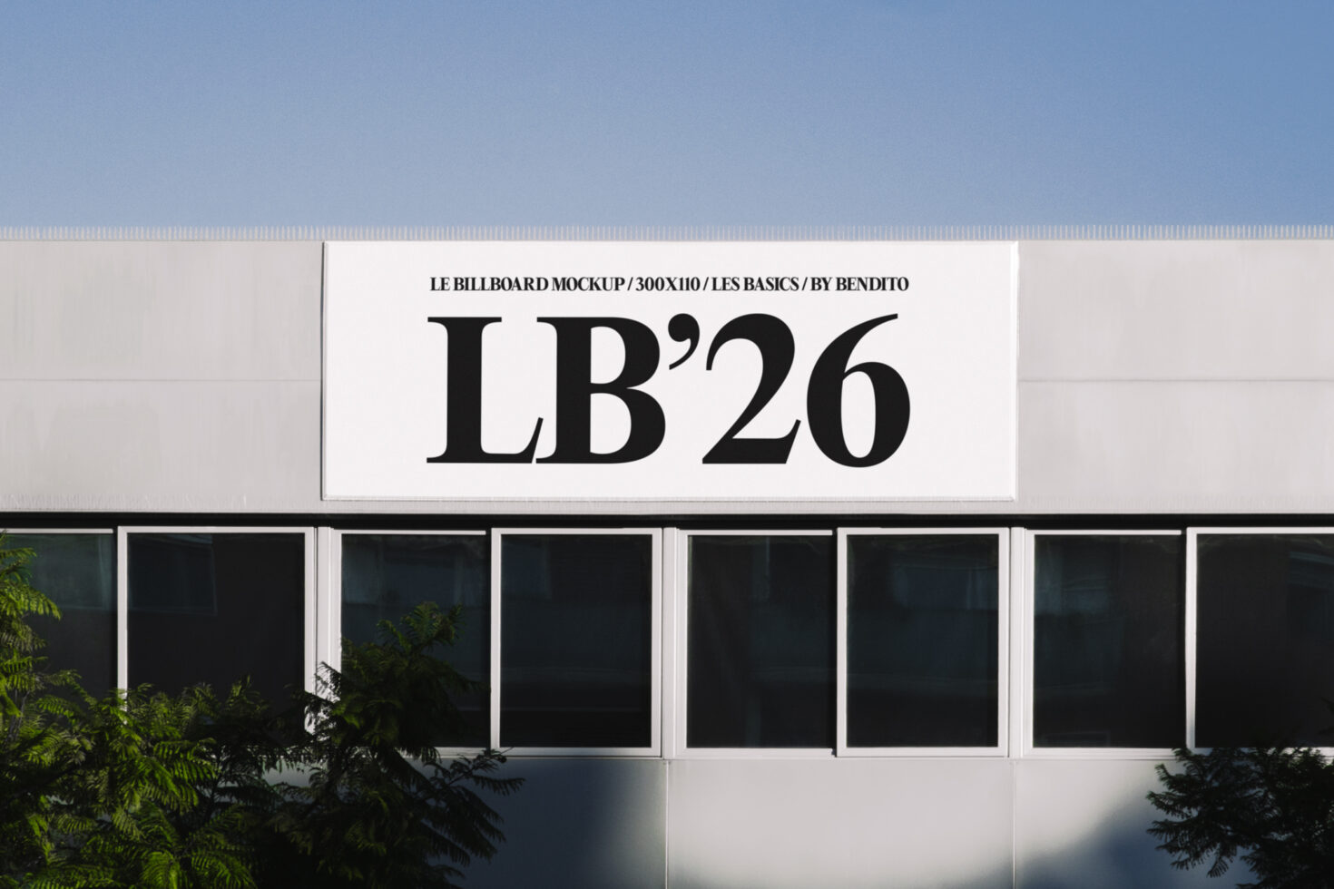 Bright storefront billboard with bold black serif type on white horizontal sign