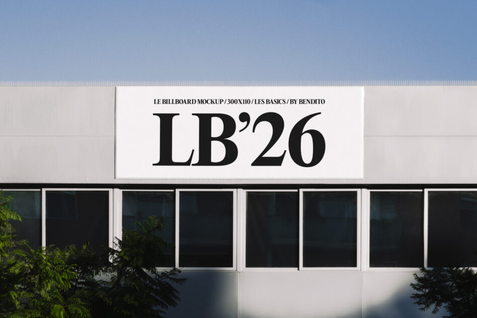 Bright storefront billboard with bold black serif type on white horizontal sign