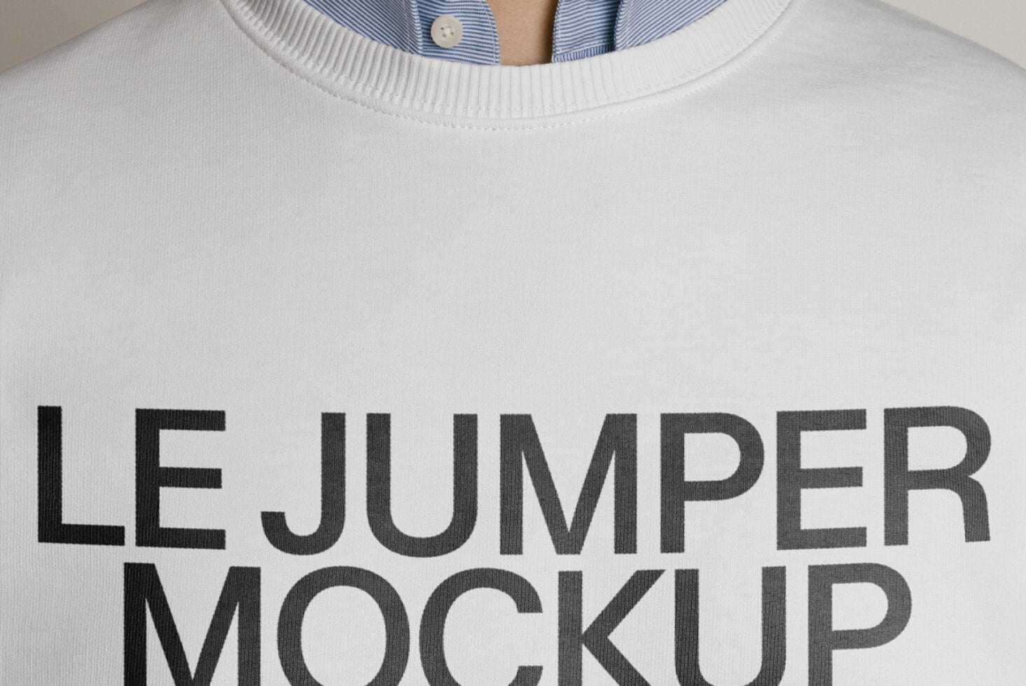 Close up of white crewneck sweatshirt with large text print