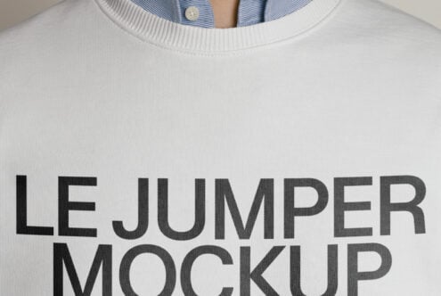 Close up of white crewneck sweatshirt with large text print