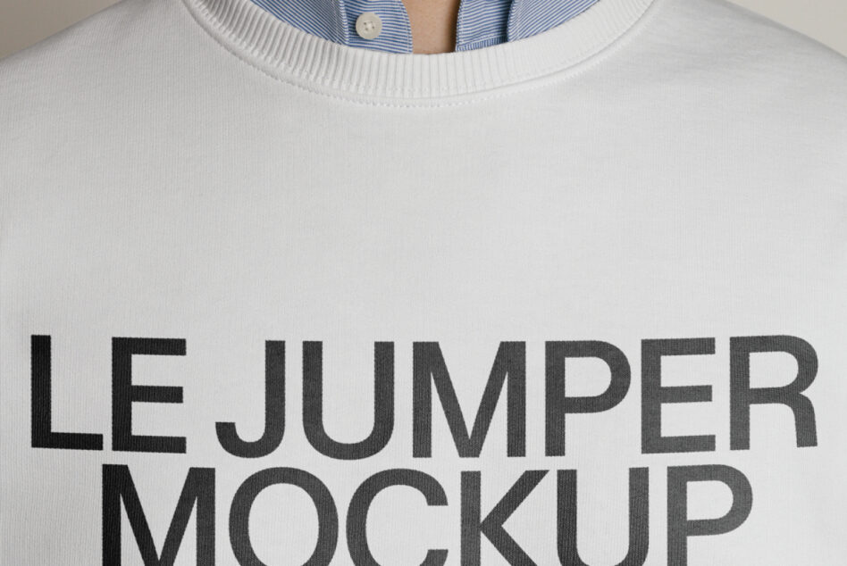 Close up of white crewneck sweatshirt with large text print