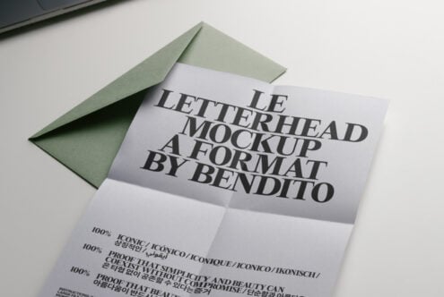 Letterhead mockup with sage green envelope showing text layout detail