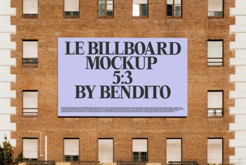 Lavender billboard on brick building showing Le Billboard Mockup 5:3 by Bendito