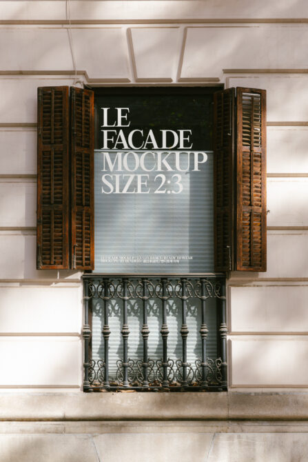 Storefront mockup on classic European facade featuring wooden shutters metal balcony