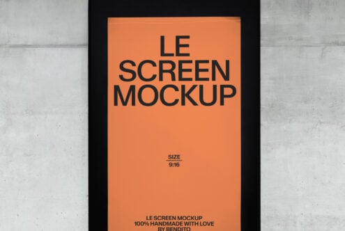 Black stand-alone display with orange screen mockup close-up view