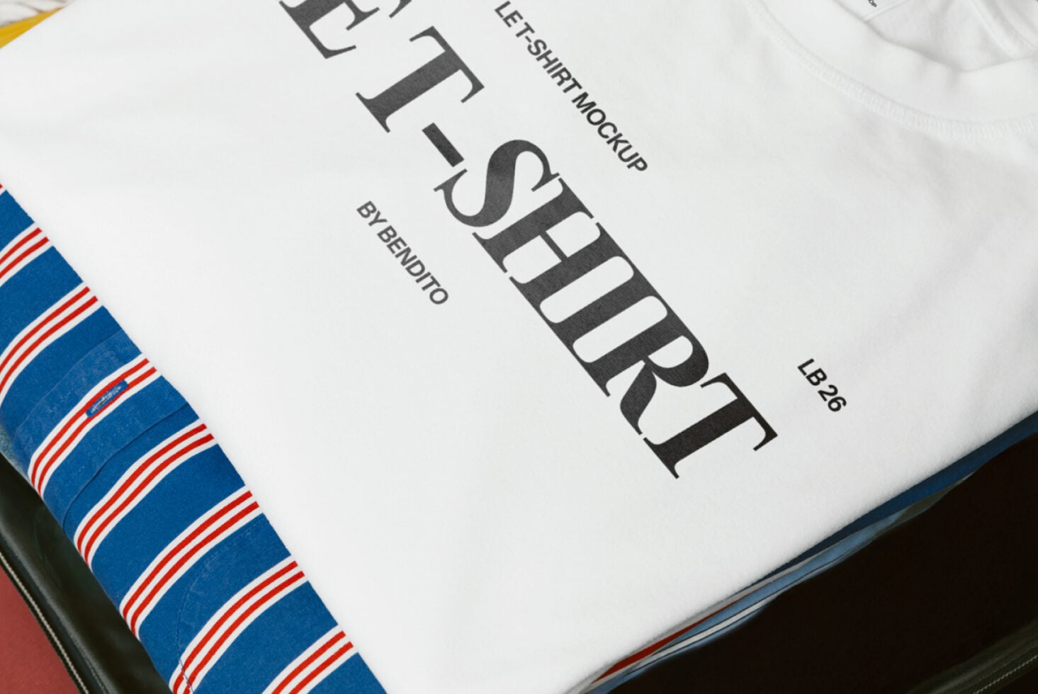 Close-up of white t-shirt print showing bold serif text on fabric