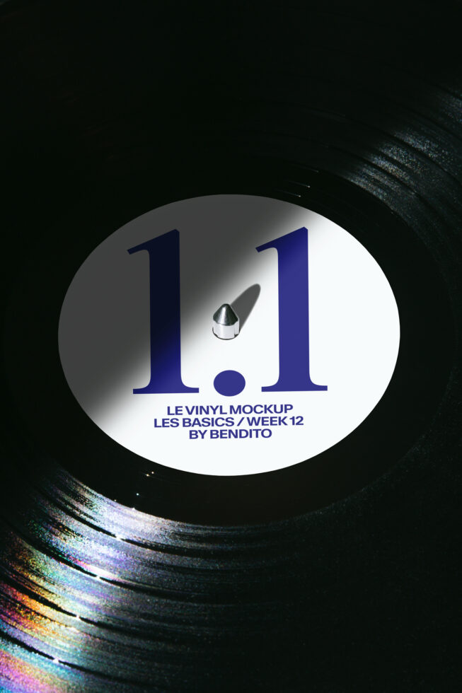 Navy vinyl record with 1.1 title, colorful glitch effect on dark