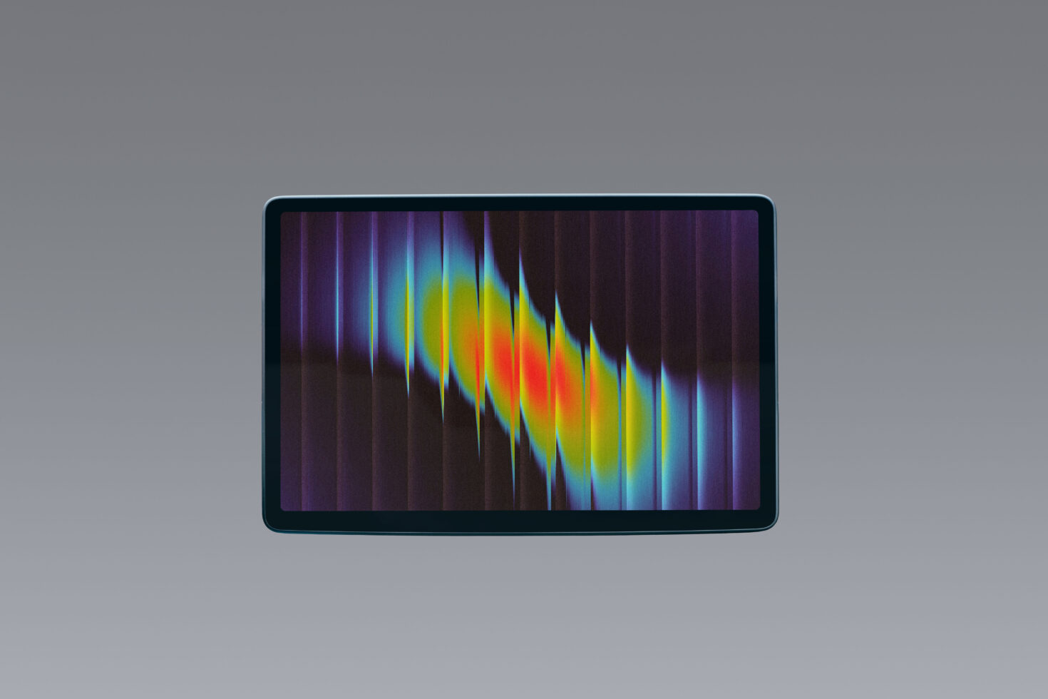 Tablet display showing colorful spectrum waveform visualization on gray background