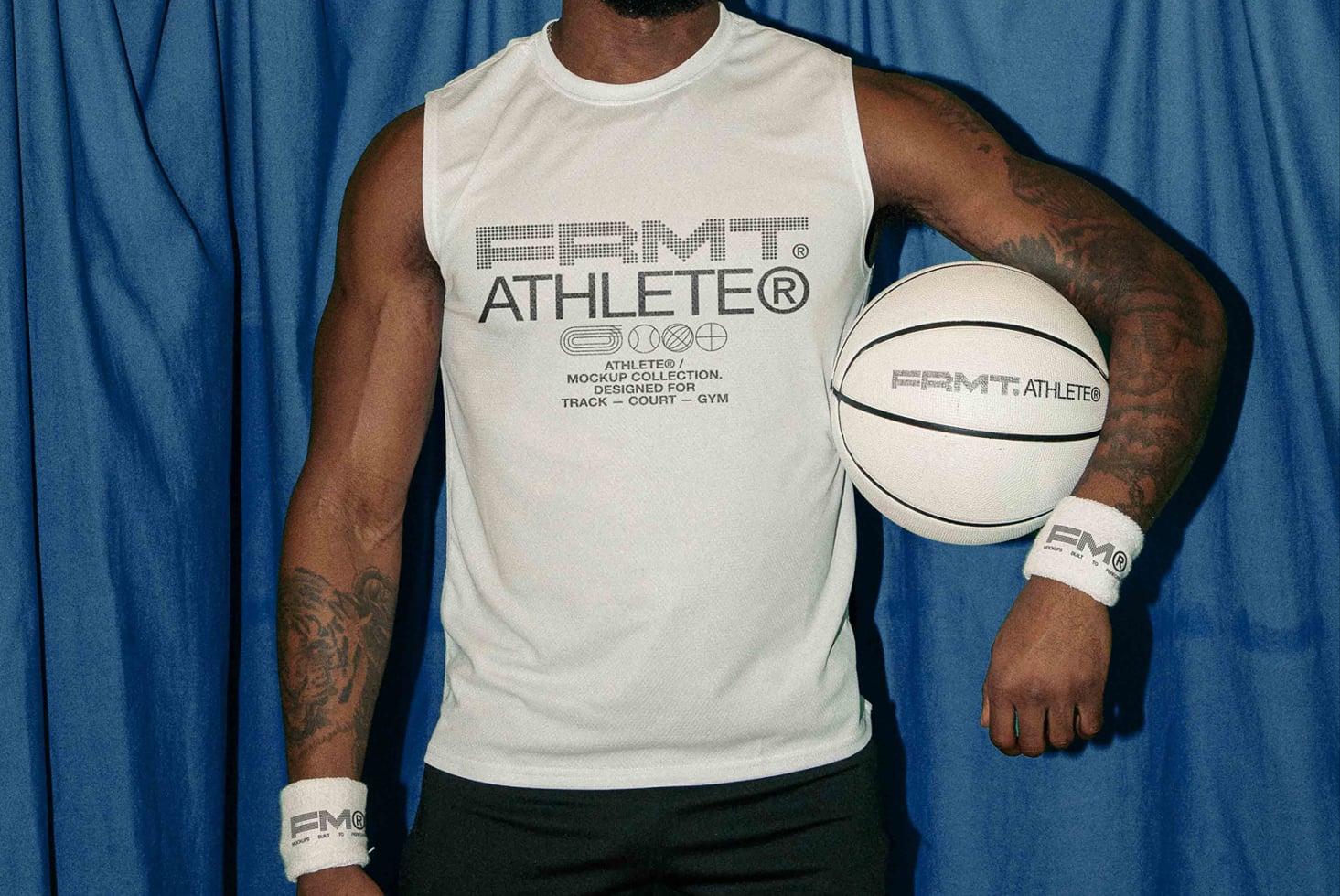 White sleeveless tank top with FRMT Athlete branding worn with matching wristbands holding basketball