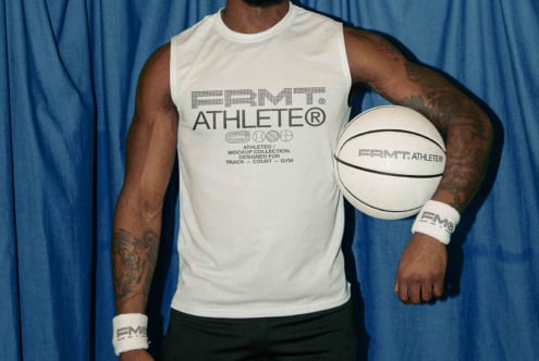 White sleeveless tank top with FRMT Athlete branding worn with matching wristbands holding basketball