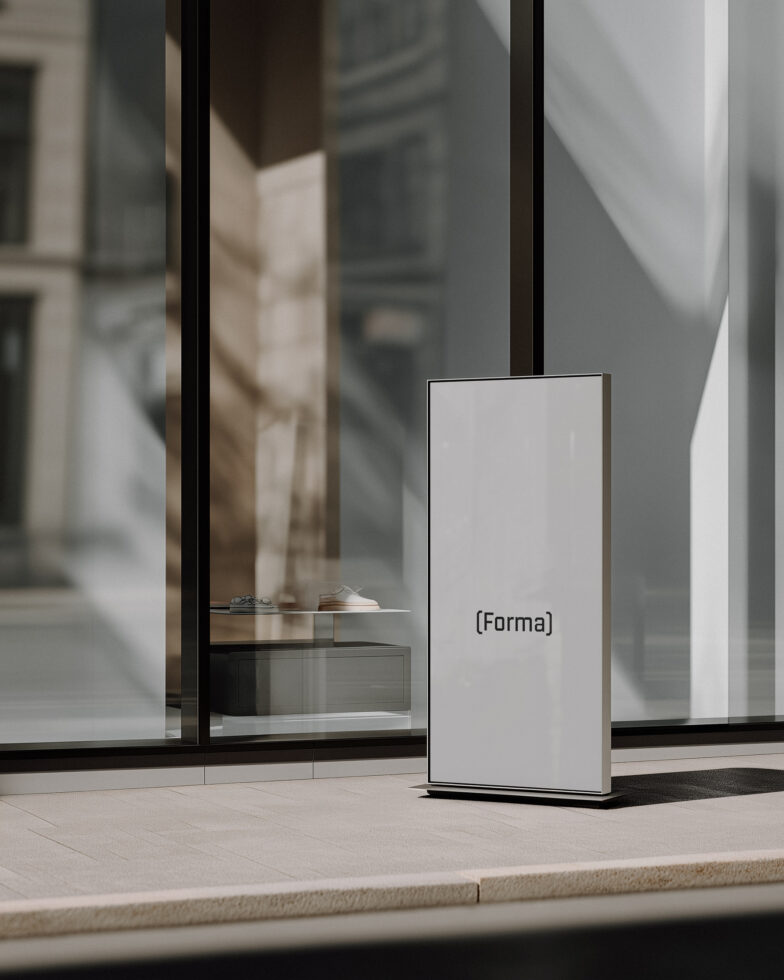 Blank white digital signage mockup standing in minimalist retail space
