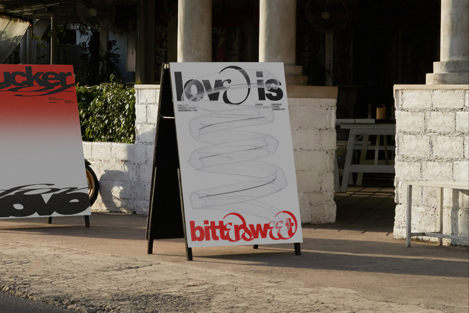 Outdoor A-frame sign displaying typographic layout with red text element