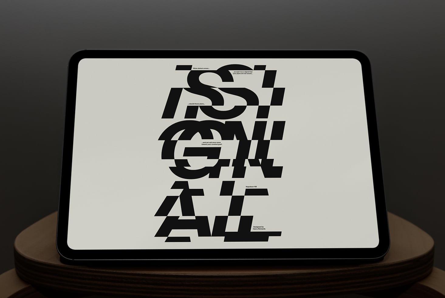 Tablet mockup showing geometric typography layout on white background