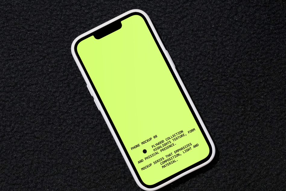 iPhone mockup angled on dark speckled background with bright neon yellow screen
