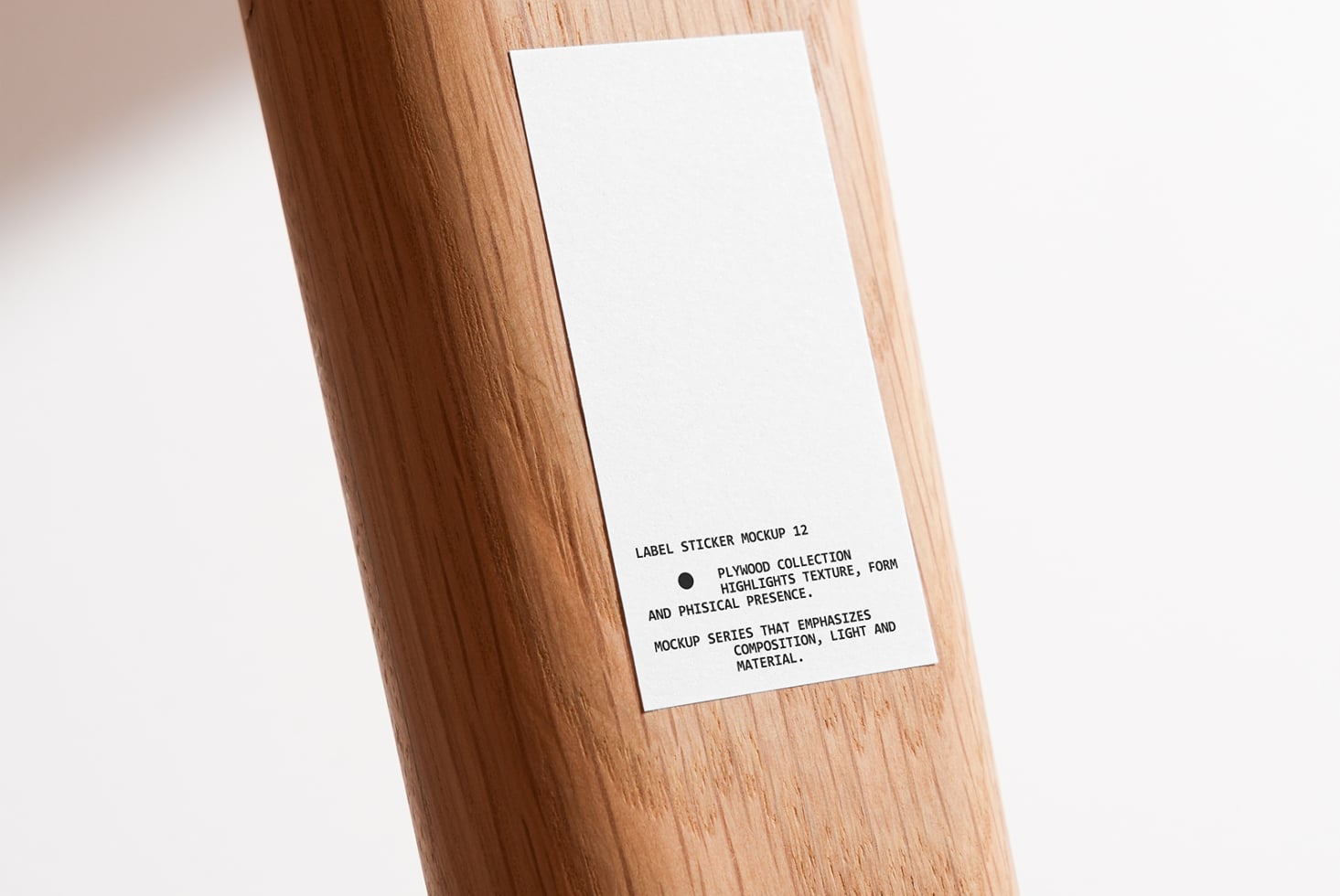 White square label sticker on wooden post mockup with soft shadows
