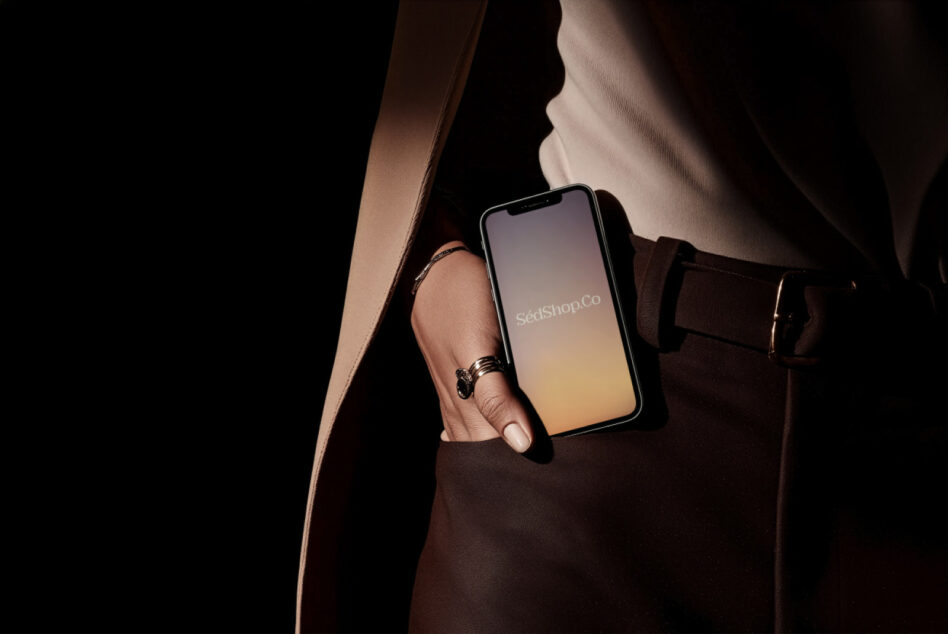 iPhone display showing soft peach-to-gold gradient with SédShop.Co text on dark background
