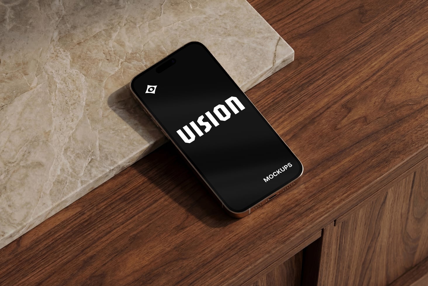 Smartphone lying flat on marble tile with black screen showing VISION text mockup