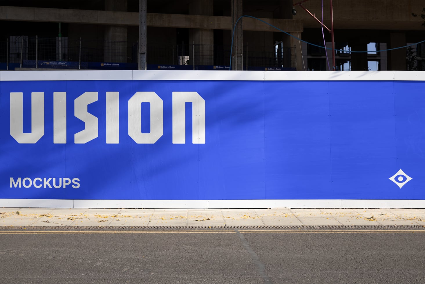 Bright blue building hoarding mockup featuring oversized UIsion lettering in white