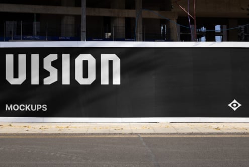 Large storefront hoarding mockup with white UIsion letters on black background