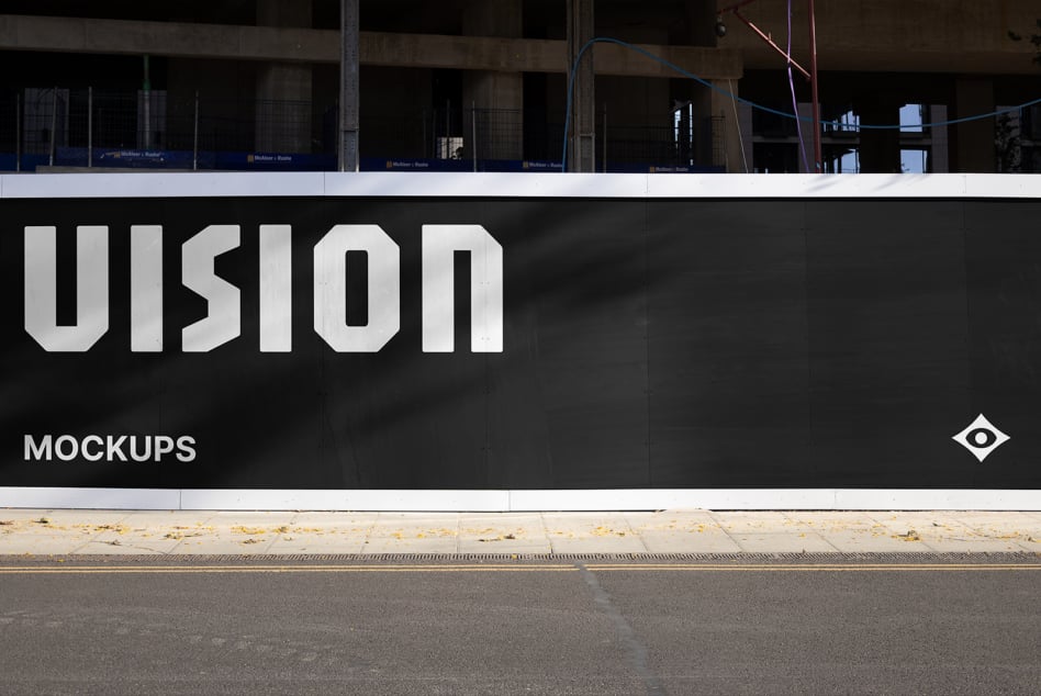 Large storefront hoarding mockup with white UIsion letters on black background