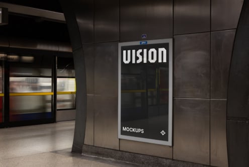 Dark subway station poster display with white VISION text on black background