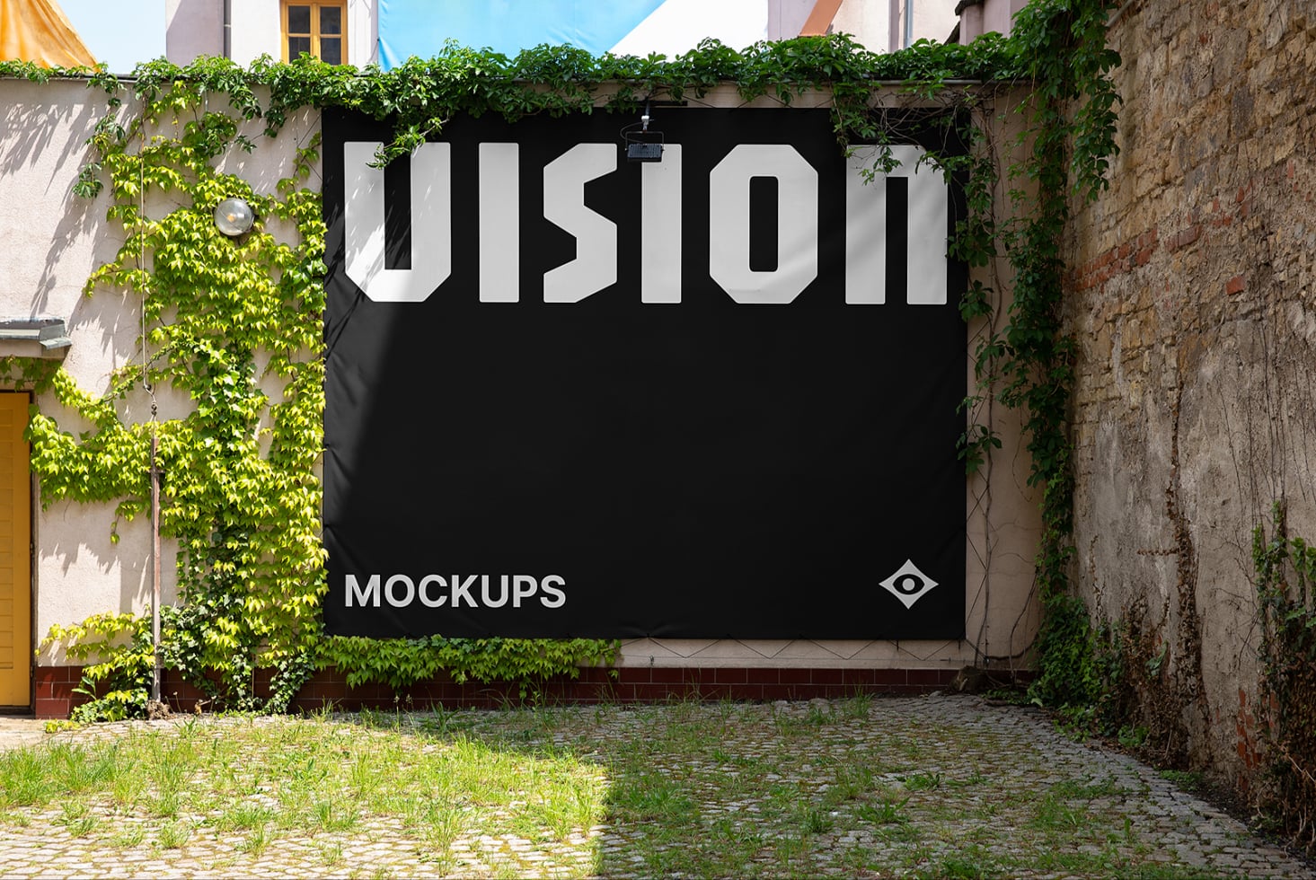 Outdoor black banner mockup with white UIsion text surrounded by climbing ivy