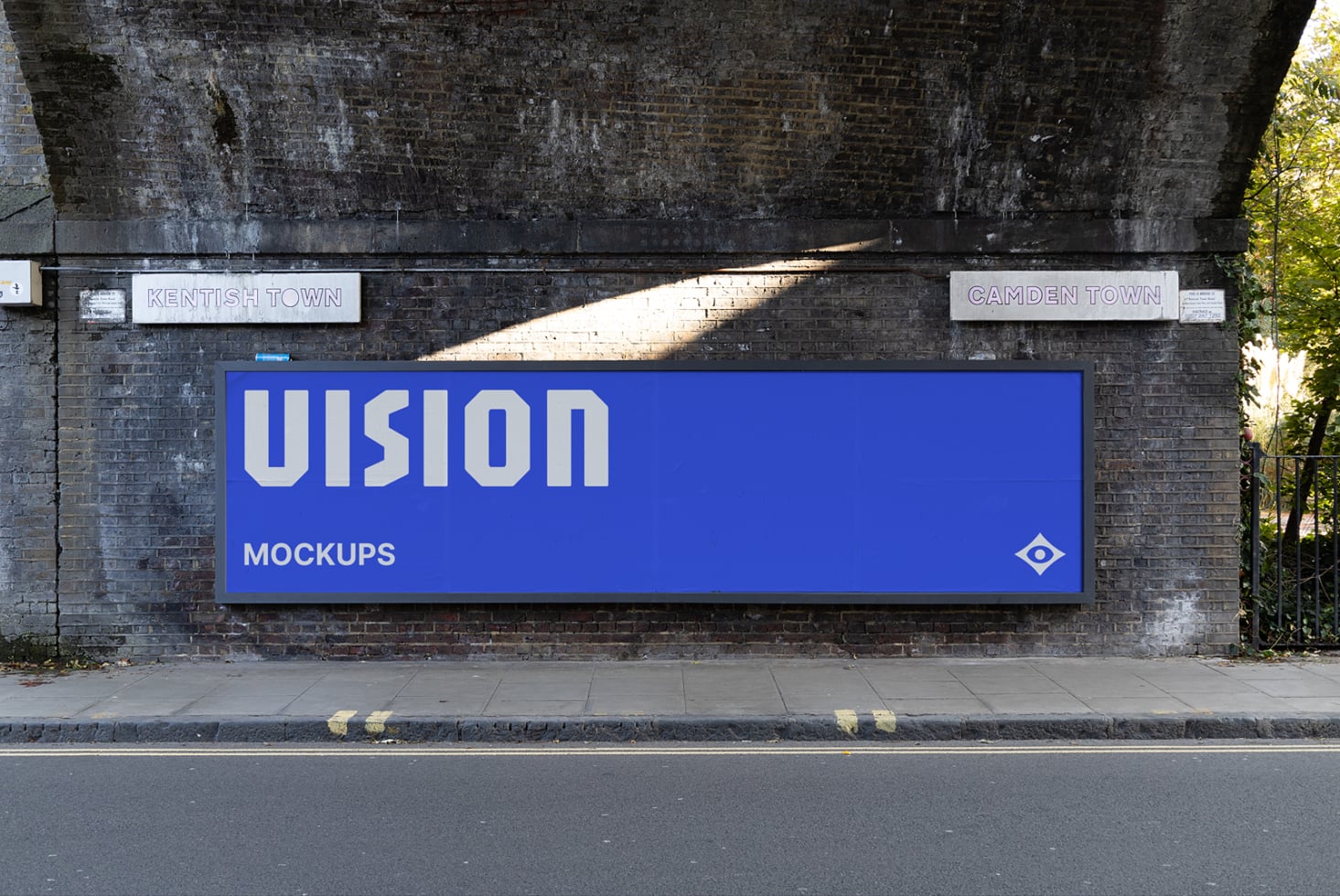Bright blue billboard displaying VISION in white letters on brick