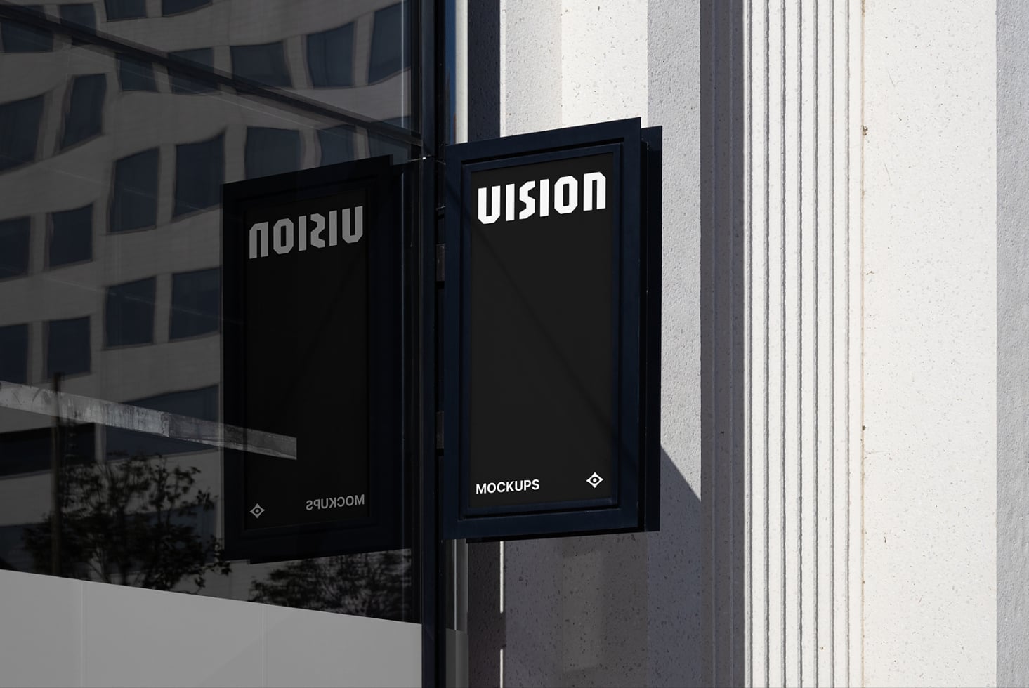 Dark storefront window with two black-framed signs showing white text mockup