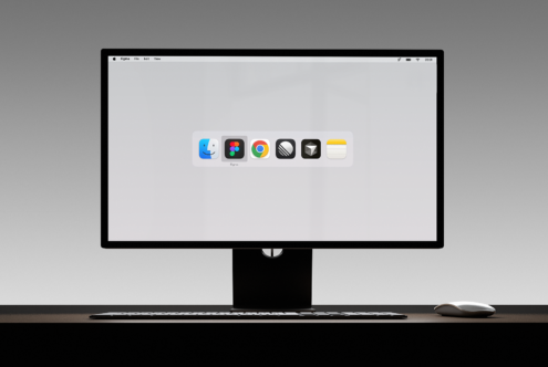 Computer screen mockup displaying app icons on a minimalist desk with keyboard and mouse. Perfect for UI and UX design presentations and digital showcases.