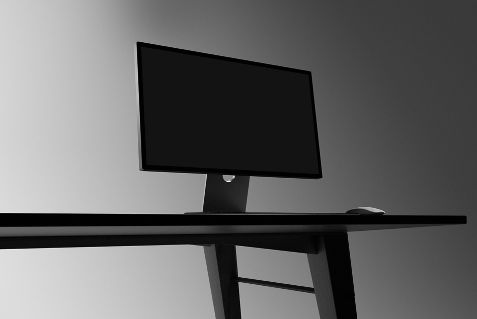 Minimalist workspace mockup displaying a sleek black monitor on a modern desk perfect for designers looking for inspiration in office setups mockups templates