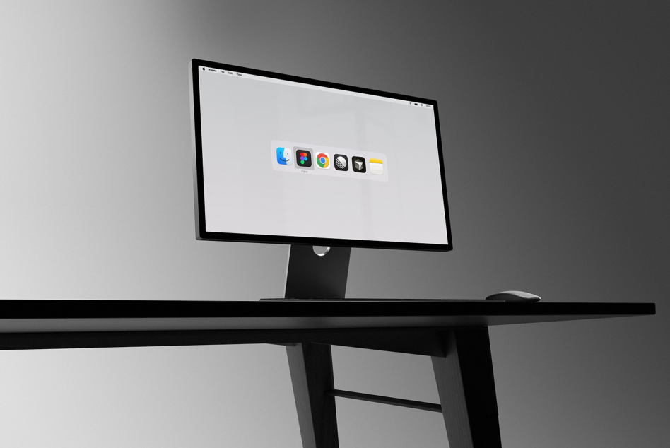 Minimalist workstation mockup featuring a sleek monitor on a black desk perfect for showcasing digital products. Ideal for designers seeking inspiration.