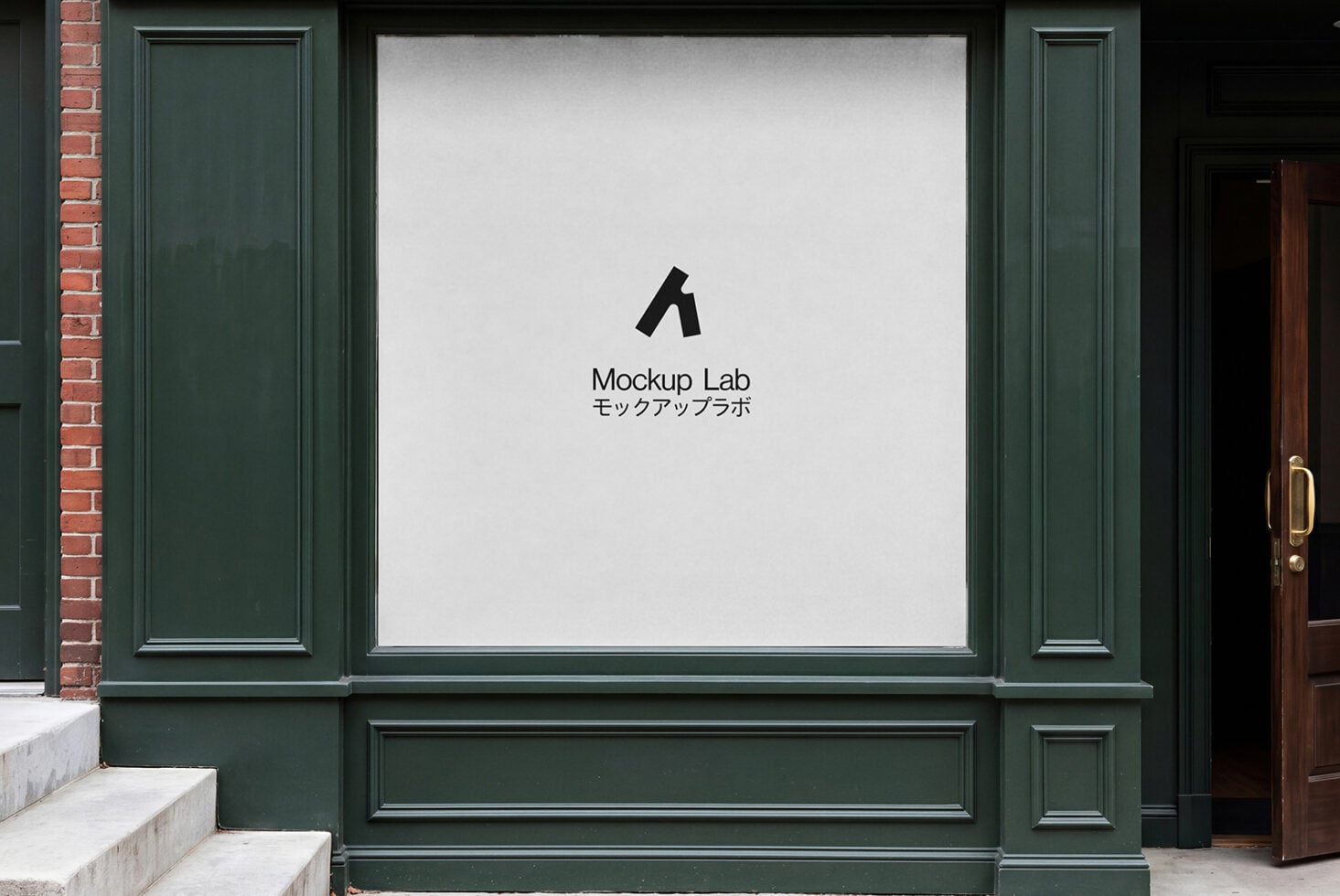 Storefront window with green frame displaying Mockup Lab logo on white wall