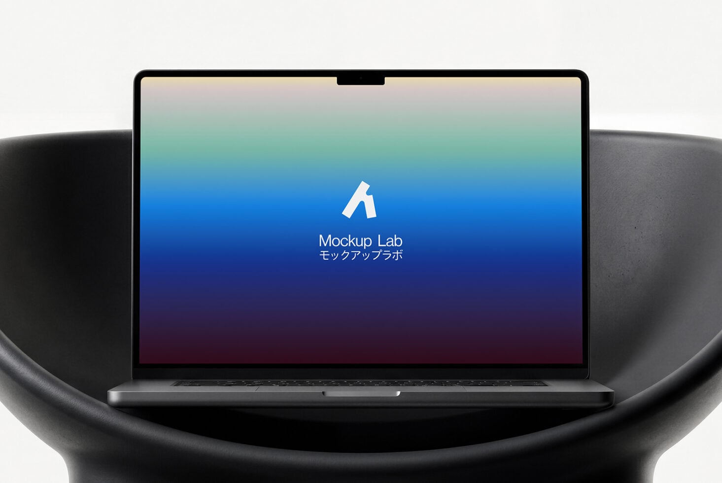 Laptop showing vibrant blue purple gradient screen design