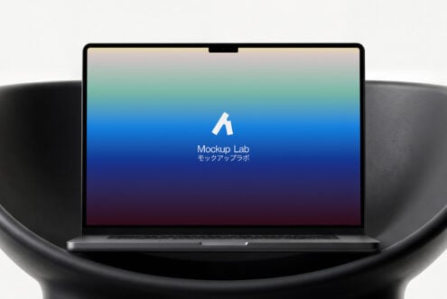 Laptop showing vibrant blue purple gradient screen design