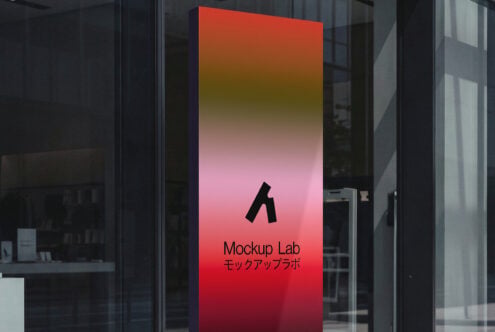 Colorful gradient sign post with red yellow pink tones outdoors