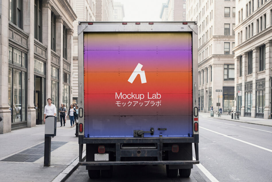 Delivery truck back display with vibrant gradient sunset colors between buildings