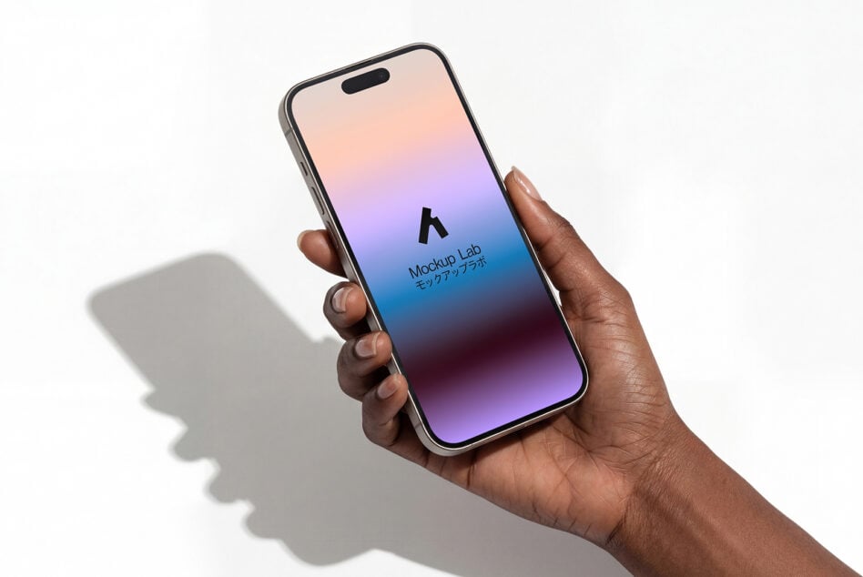 Hand holding phone with gradient peach to purple screen displaying Mockup Lab branding