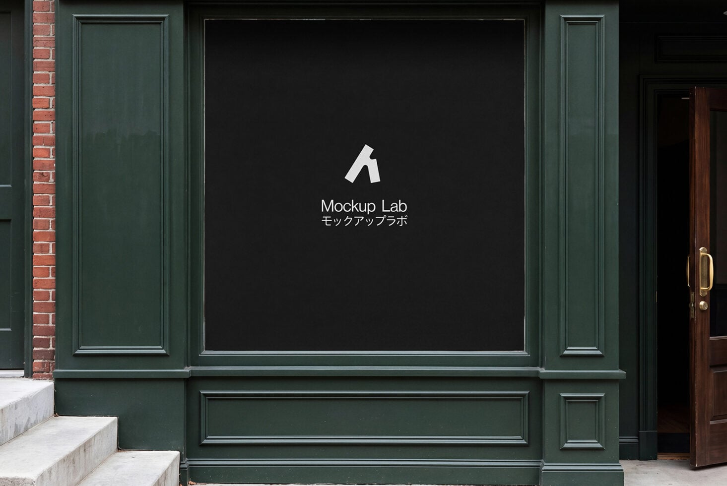Large storefront window in green frame showing dark display with logo centered